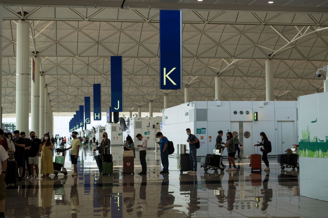 Travelers in the departure hall of Hong Kong International Airport on September 26.